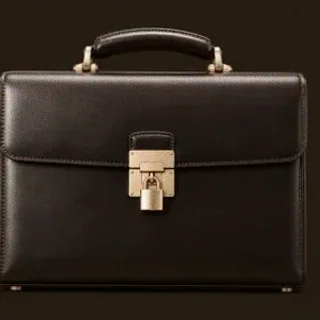 Locked leather briefcase — Ruby Reels
